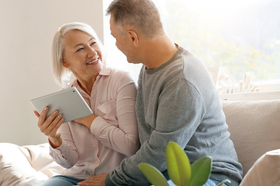 Happy retired couple with final expense life insurance in place